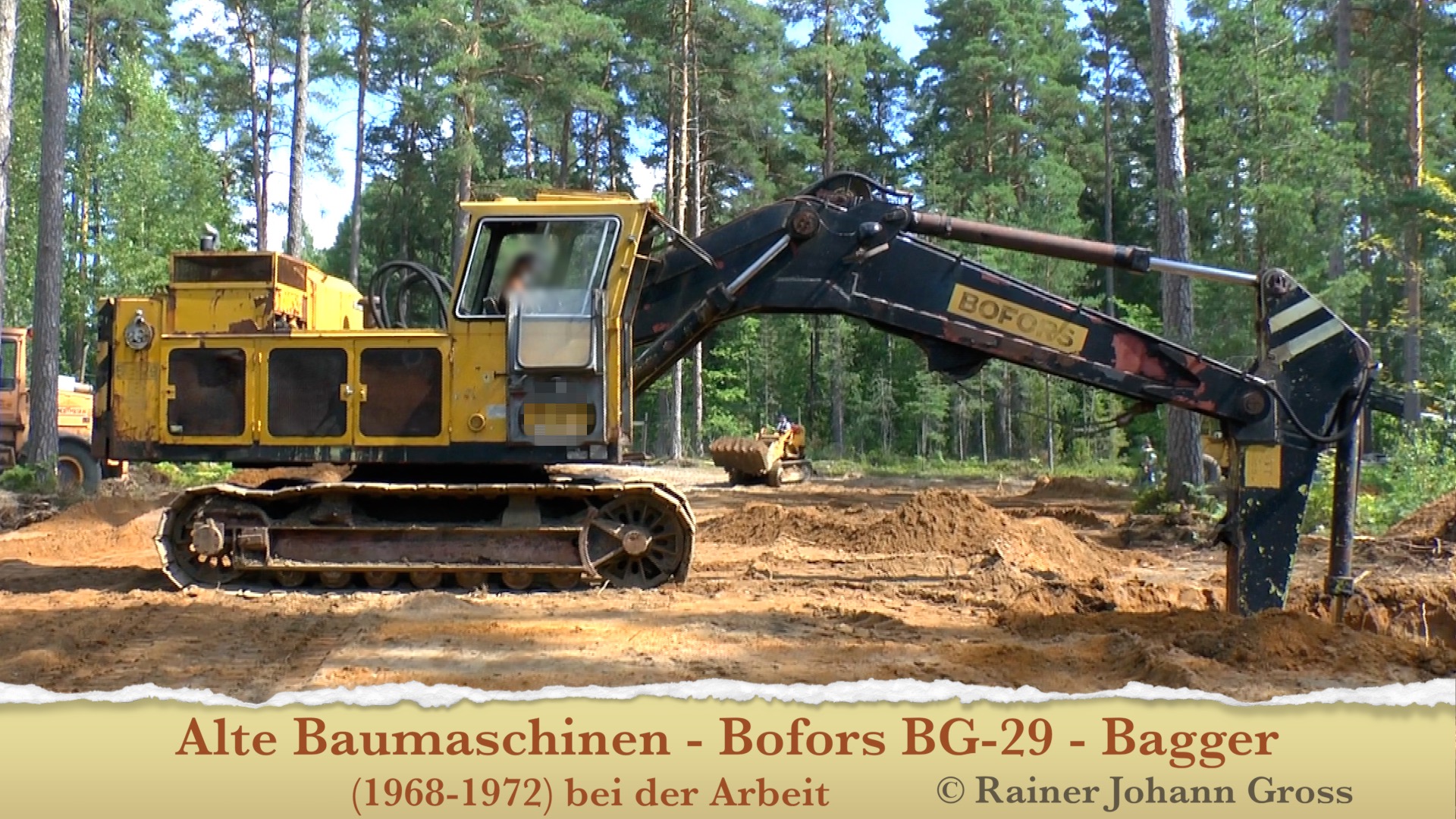 Back of a man at a concert. Hes wearing a beanie hat and a baggy denim jacket with studs. Photo with a purple hue